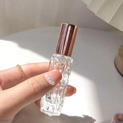 Botella de perfume de 10/15 ml/botella de cosméticos/botella de vidrio/diseño portátil/logotipo personalizado/fabrica mayorista/venta caliente